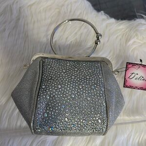 NWT- Deline evening bag gold glittery w/kiss closure, no chain strap